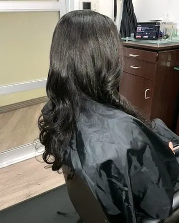 Glossy sew-in install, finished and styled.