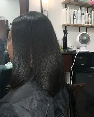 A sleek, flat silk press finish.